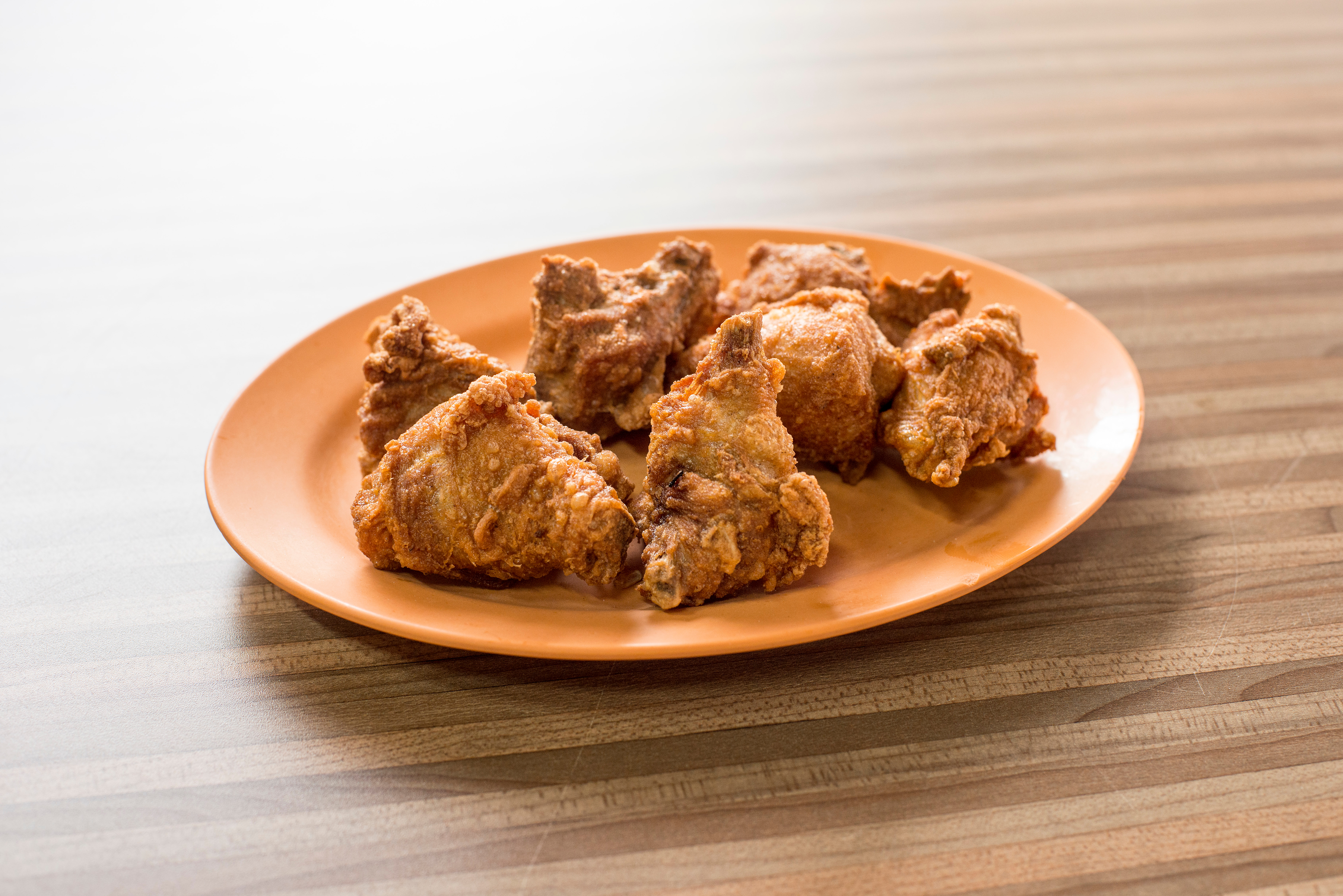 High Angle View Of Fried Chicken In Plate On Table