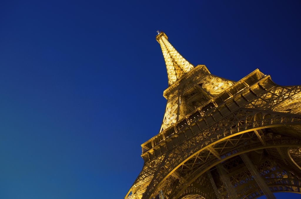 Eiffel Tower in Paris illuminated at night