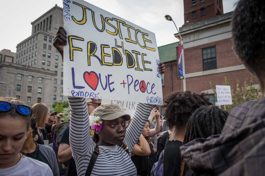 Tensions with Baltimore residents continue as protestors march in solidarity for Freddie Gray