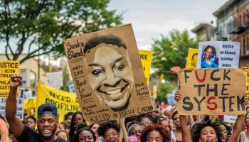 About a thousand Black Lives Matter activists rally at the...