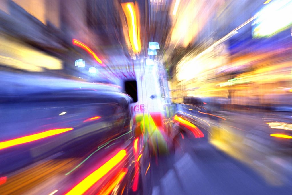 Blurred ambulance in traffic