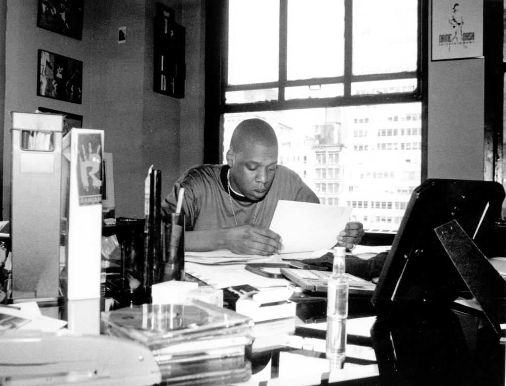 Jay Z Looks Over Some Documents