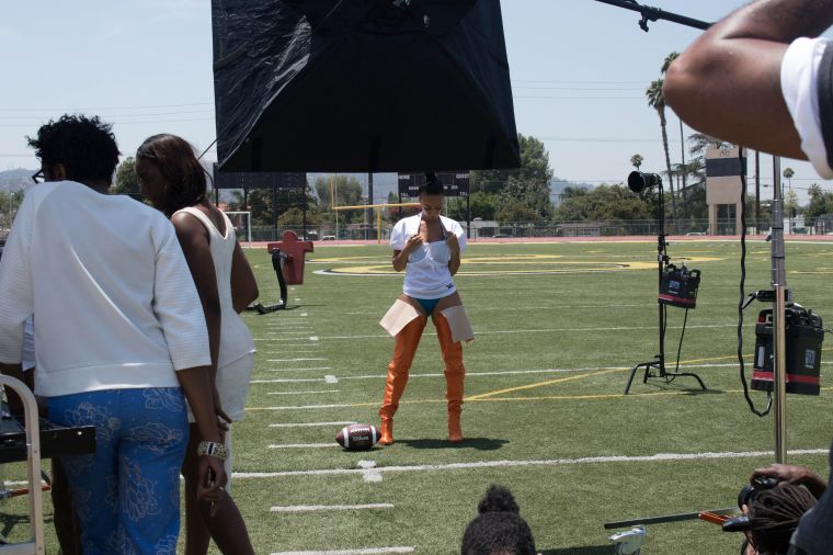 Draya made orange over-the-knee boots look like part of the game. Hello, Manolo Blahnik.