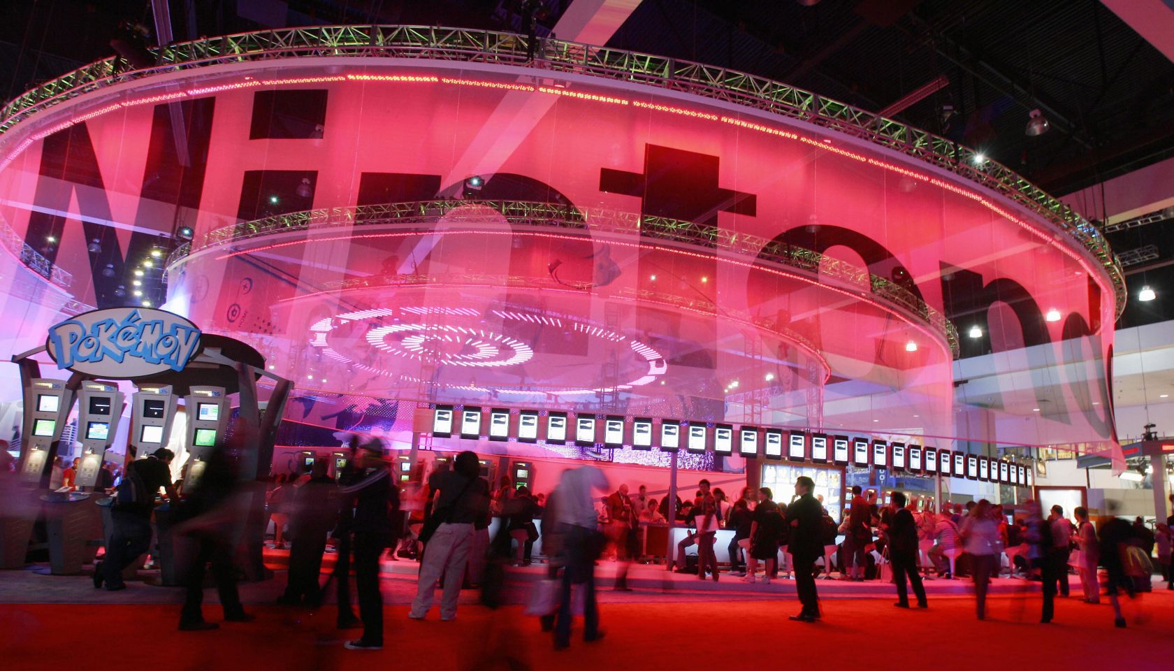 Visitors walk past of the Nintendo area