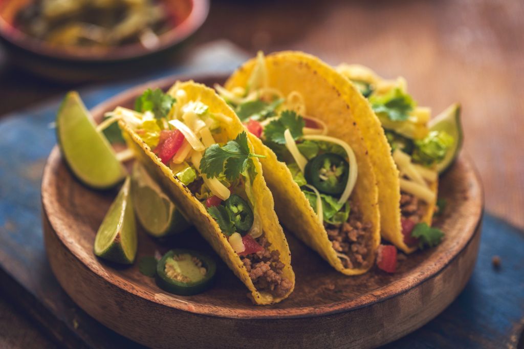 Mexican Tacos with Spicy Salsa, Minced Meat and Guacamole