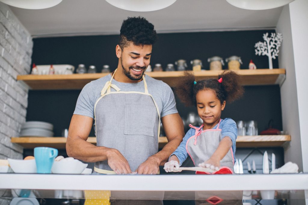 Helping dad in the kitchen