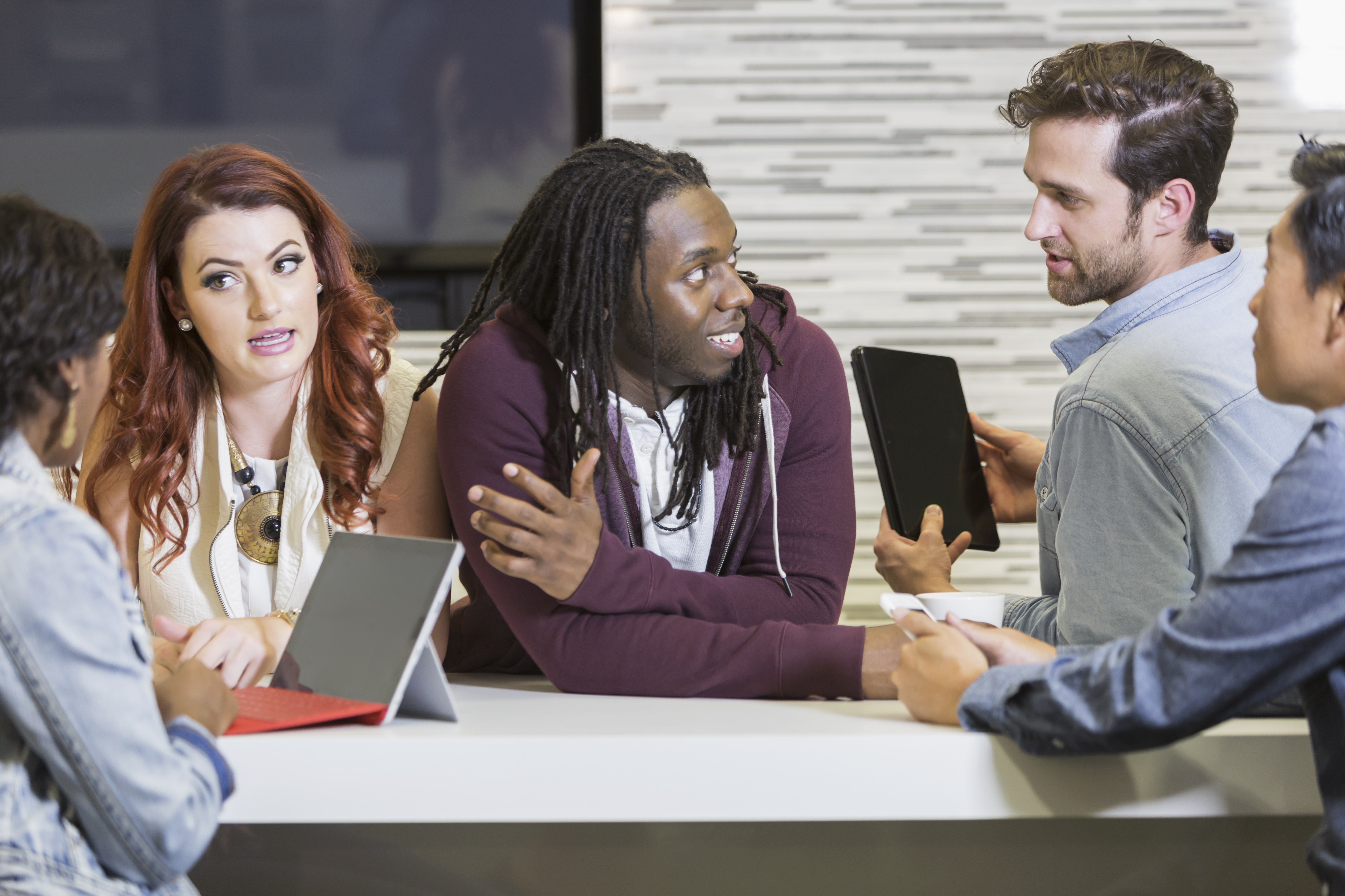Group of diverse multi-racial business people meeting