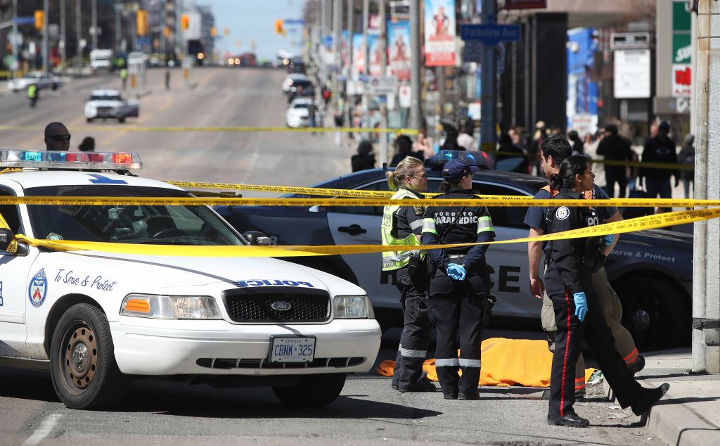 Police investigate a van that ran down pedestrians along Yonge Street between Sheppard and Finch streets in Toronto
