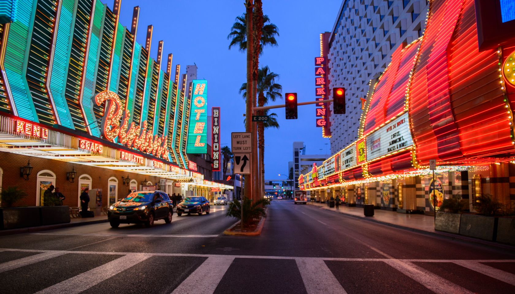 Road signs and casino hotel at Fremont Street in downtown Las Vegas, Nevada, USA