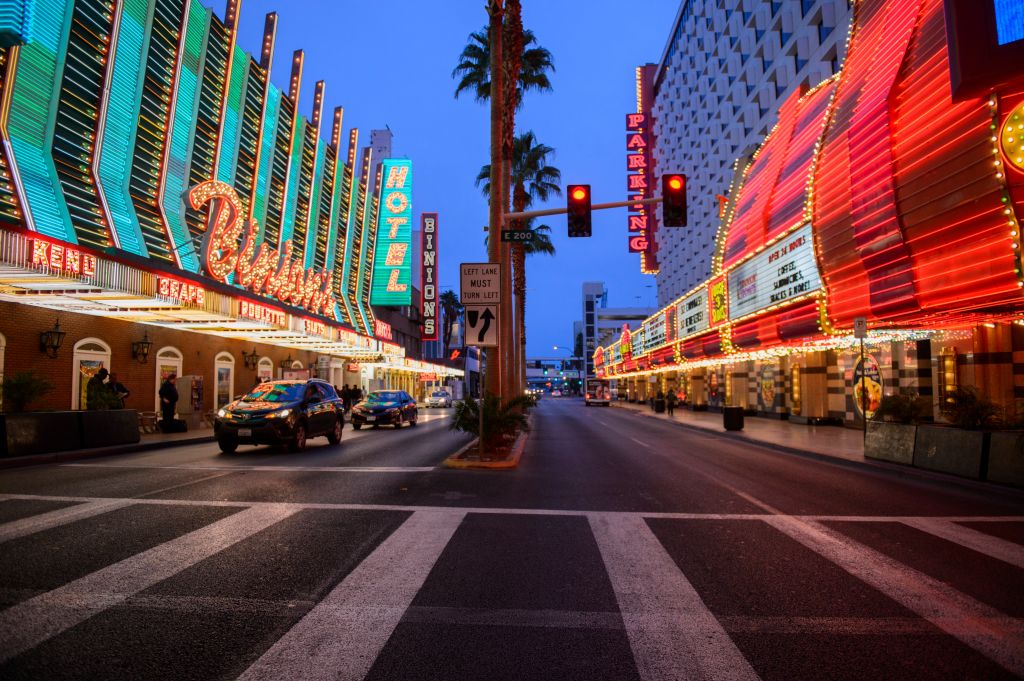 Road signs and casino hotel at Fremont Street in downtown Las Vegas, Nevada, USA