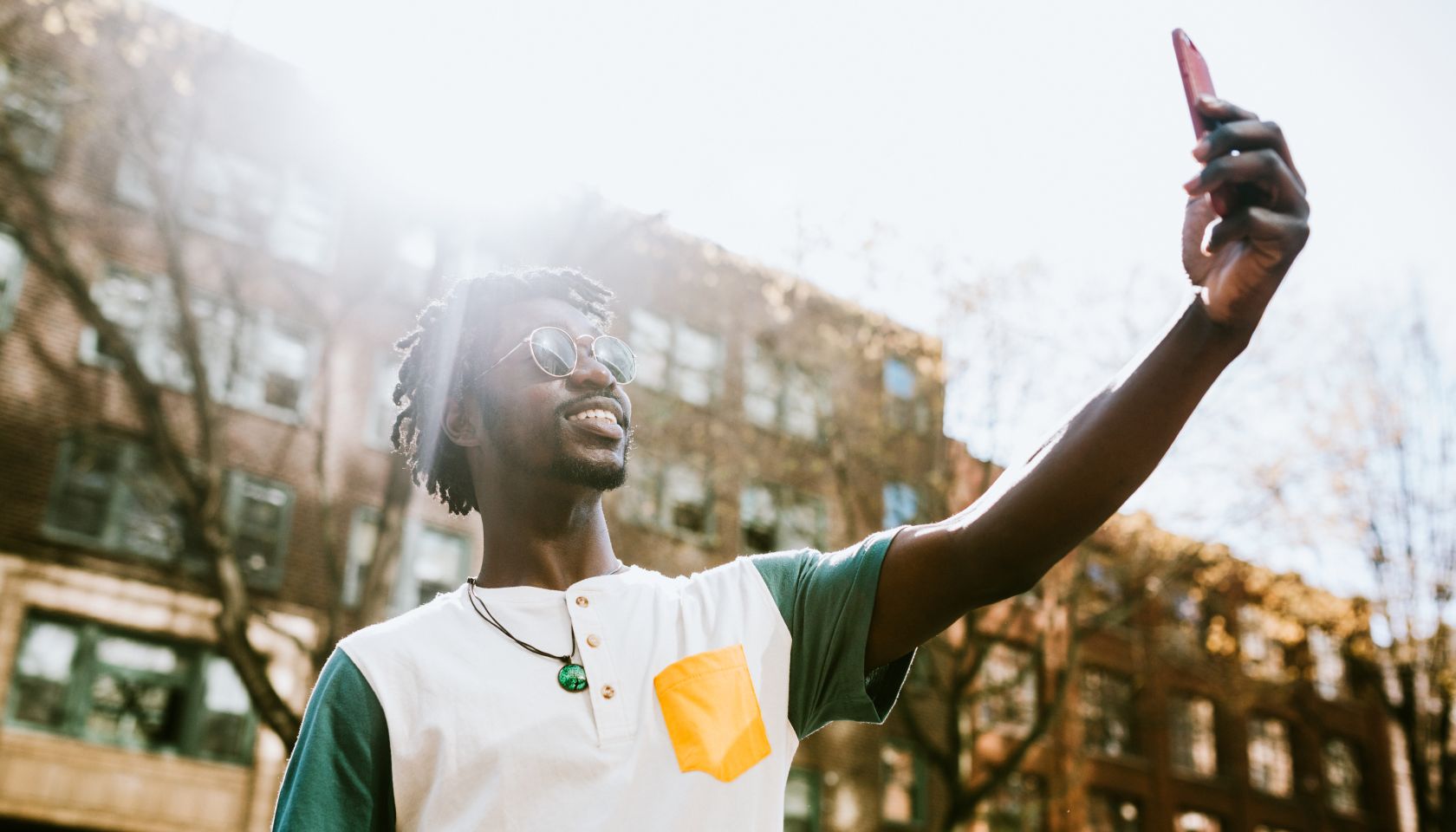 A Young Man Takes Selfie in Downtown Seattle