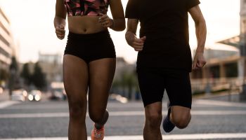 Cropped image of fit jogger couple
