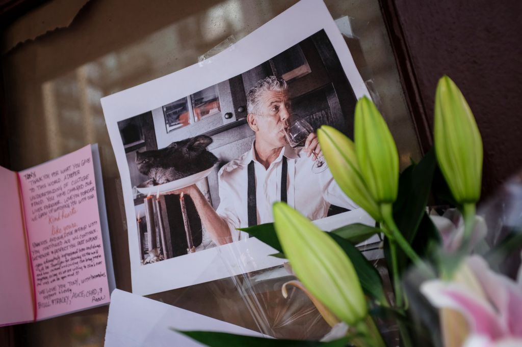 Mourners Leave Flowers At Anthony Bourdain's Former Restaurant, After His Suicide Death