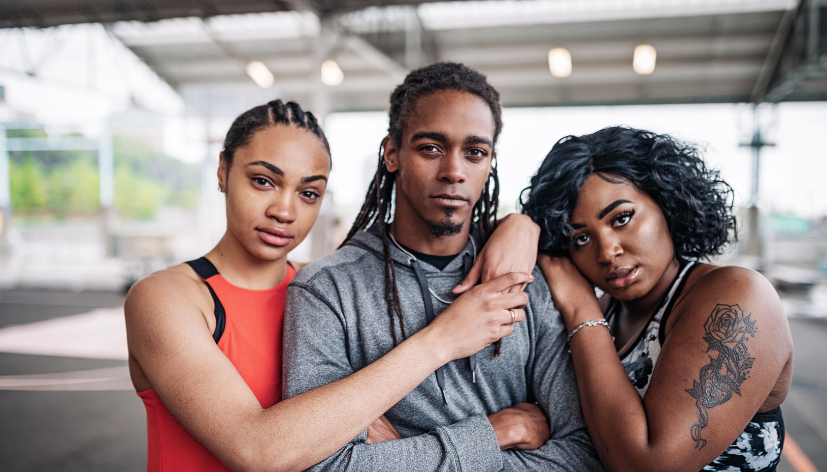 Trainer with his female trainees on sport court in NYC