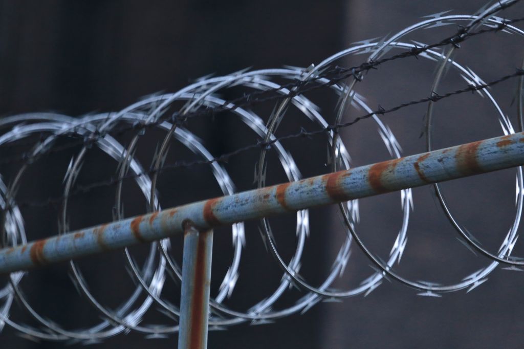 Close-up of Concertina wire on the prison fence