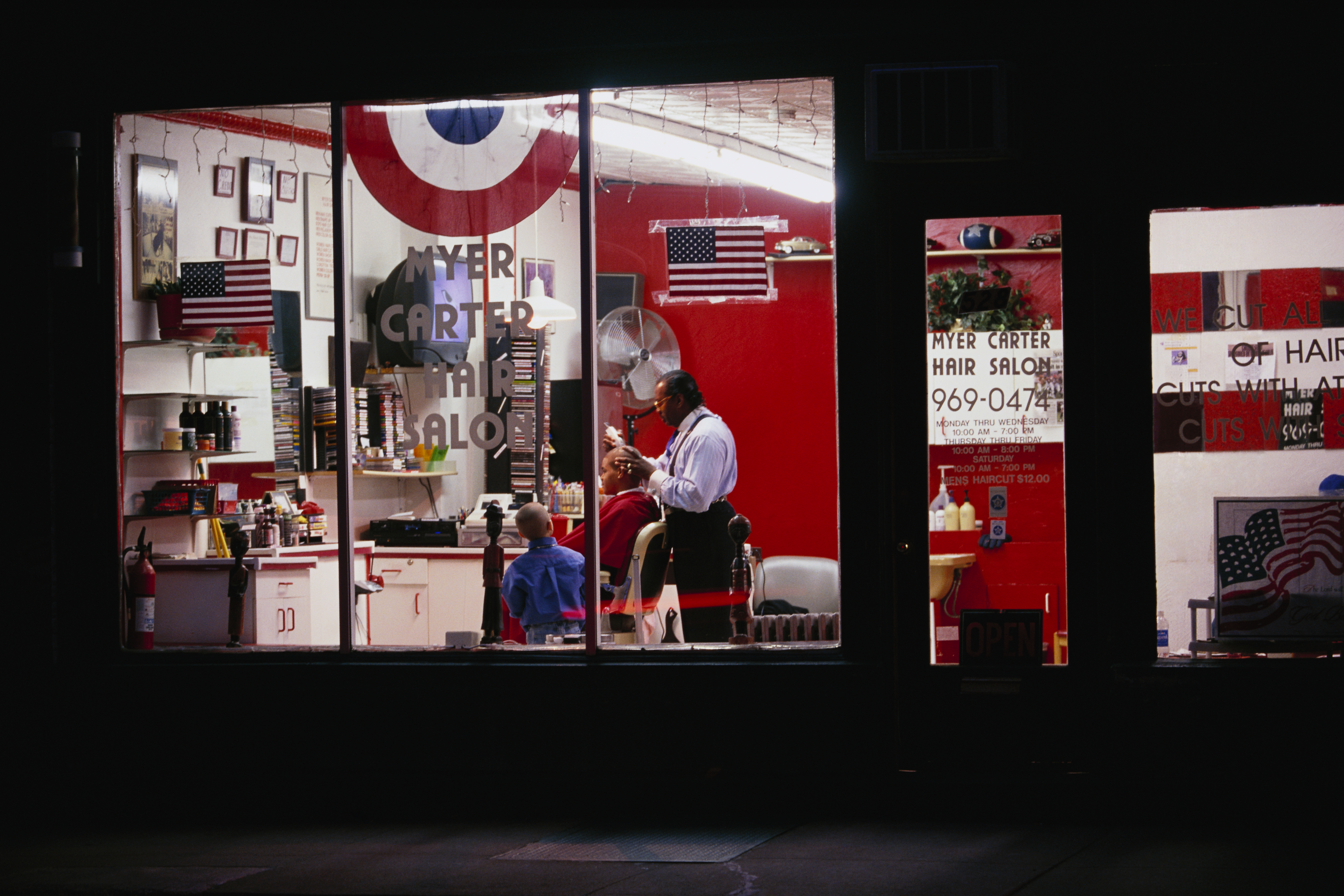Man Receiving Haircut in Barber Shop
