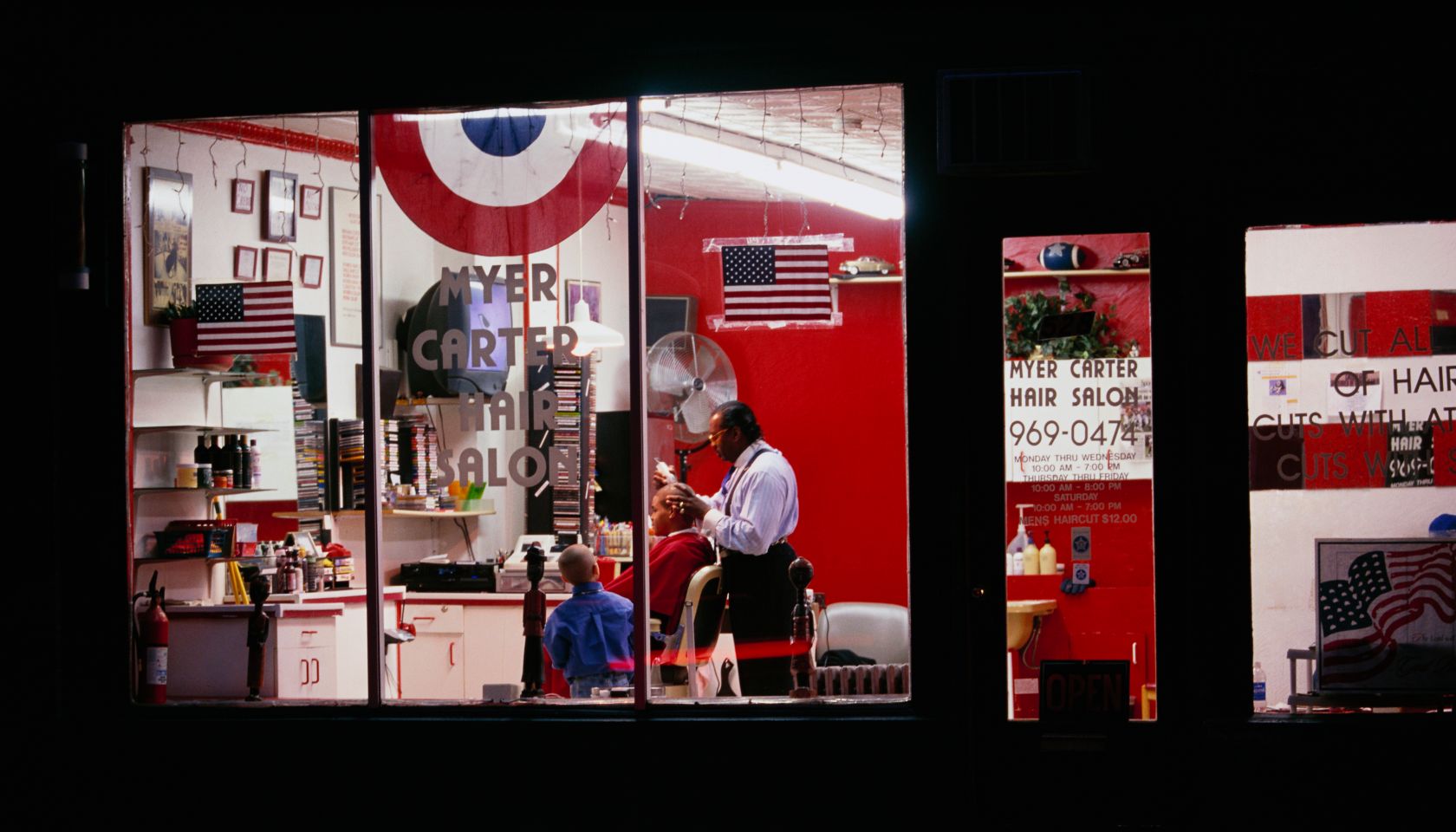 Man Receiving Haircut in Barber Shop
