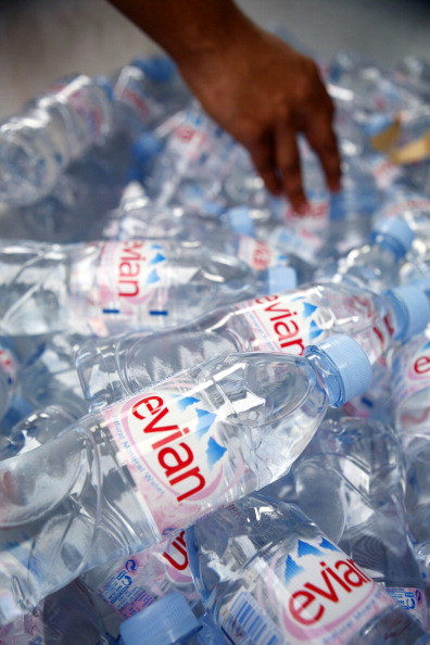 Picture shows: Bottles of Evian water; a Danone product.