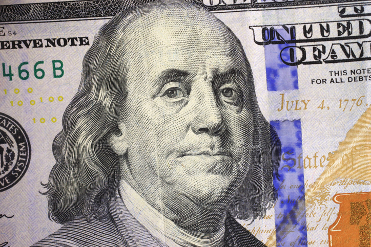 Benjamin Franklin portrait on a one hundred dollar bill, close up