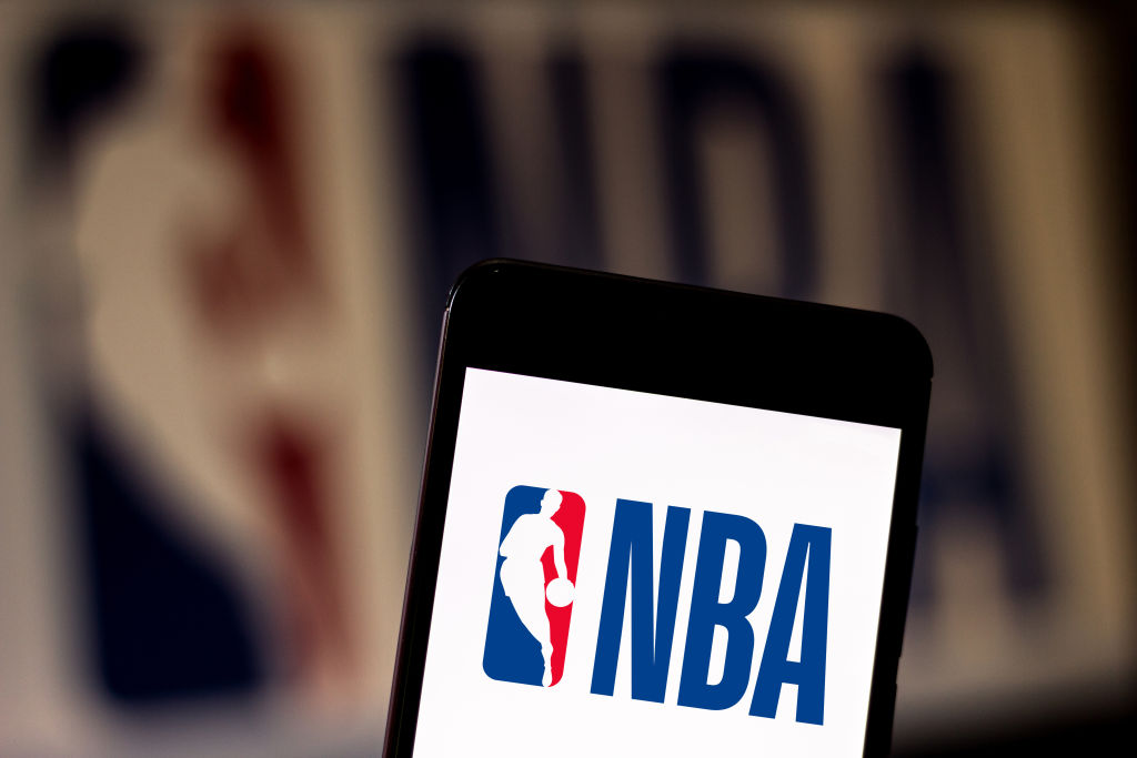 In this photo illustration a National Basketball Association...