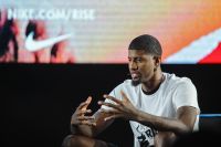 Paul George of the Indiana Pacers, makes hand gestures...