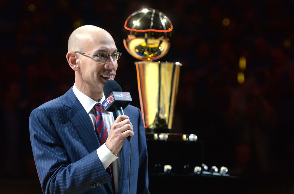 NBA Commissioner Adam Silver talks to the crowd attending the Golden State Warriors ring ceremony held before the season opener against the New Orleans Pelicans at Oracle Arena in Oakland, Calif., on Tuesday, Oct. 27, 2015. The event also featured the rai
