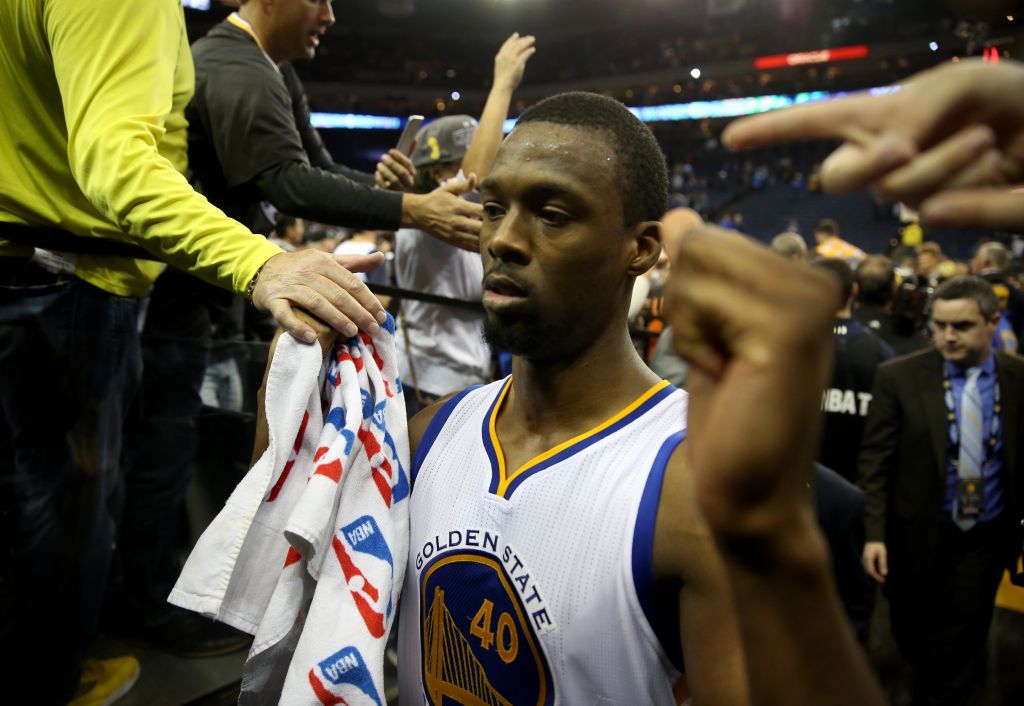 Golden State Warriors' Harrison Barnes (40) is greeted by fans as he leaves the court after their 112-101 win over the San Antonio Spurs in an NBA game at Oracle Arena in Oakland, Calif., on Thursday, April 7, 2016. (Jane Tyska/Bay Area News Group)