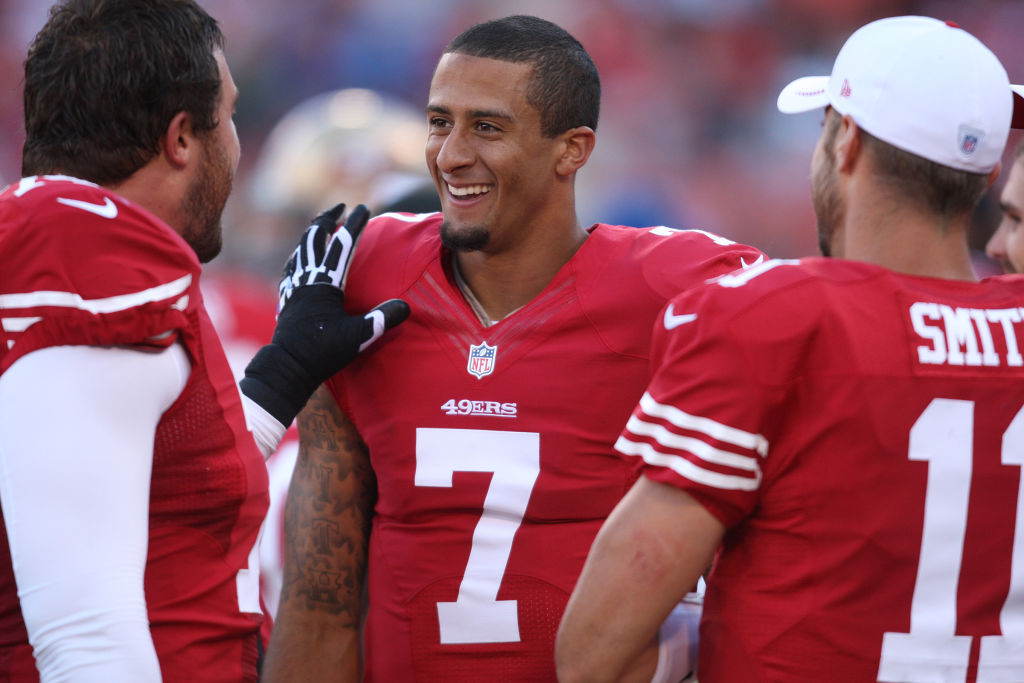 San Francisco 49ers' Colin Kaepernick is congratulated by Joe Staley after running for a 78-yard touchdown in the second quarter at Candlestick Park in San Francisco, Calif. on Friday, Aug. 10, 2012. The San Francisco 49ers played the Minnesota Vikings. (