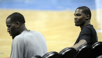DENVER, CO--Kevin Durant, right, and Kendrick Perkins, Oklahoma City Thunder, take a breather on the bench after practice at Pepsi Center Friday afternoon. Andy Cross, The Denver Post