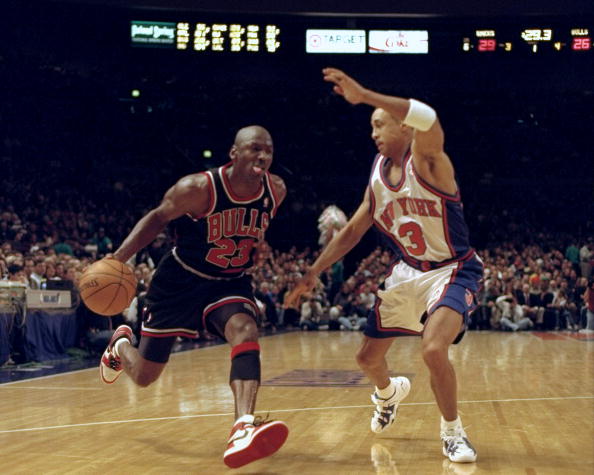 Chicago Bulls' Michael Jordan tries to get past New York Kni