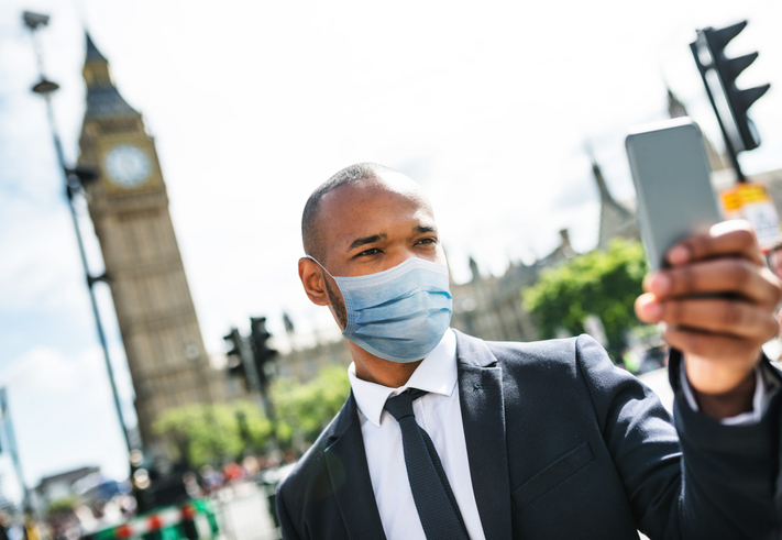 businessman in london with mask