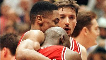 Scottie Pippen (L) hugs Chicago Bulls teammate Mic