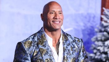 Actor Dwayne Johnson (The Rock) wearing Dolce & Gabbana arrives at the World Premiere Of Columbia Pictures&apos; &apos;Jumanji: The Next Level&apos; held at the TCL Chinese Theatre IMAX on December 9, 2019 in Hollywood, Los Angeles, California, United
