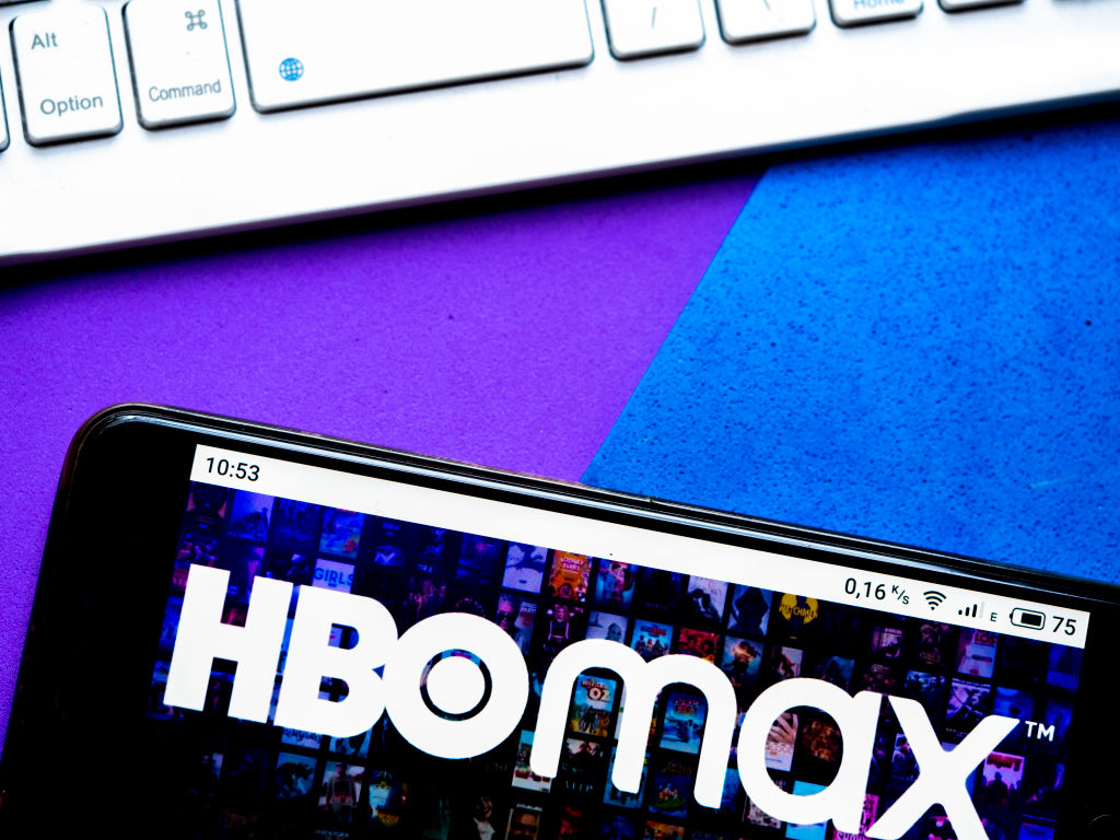 In this photo illustration an HBO Max logo seen displayed on...