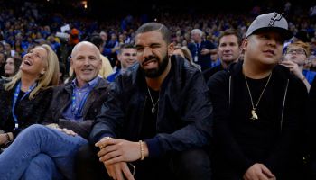 Canadian rapper Drake winks to the camera while attending the Golden State Warriors vs. San Antonio Spurs game at Oracle Arena in Oakland, Calif., on Monday, Jan. 25, 2016. (Jose Carlos Fajardo/Bay Area News Group)