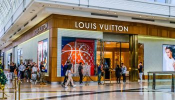 Pre Christmas shoppers lining up at Louis Vuitton store in...