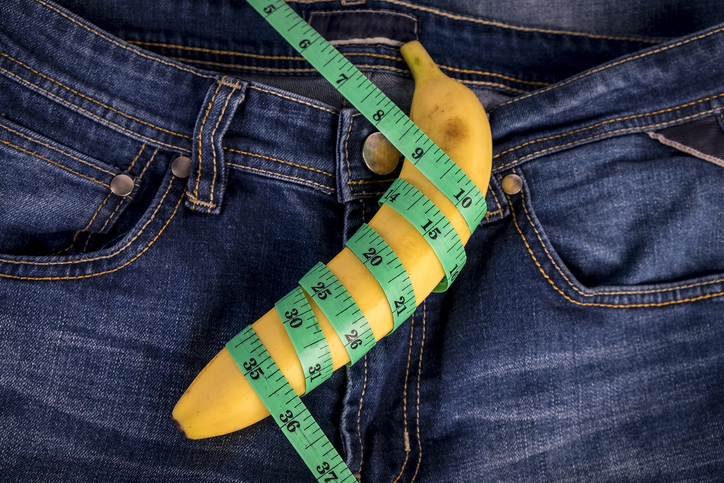 Directly Above Shot Of Banana And Tape Measure On Jeans