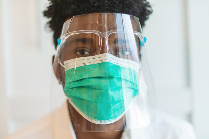 Black Millennial Male Wearing Protective Face-Mask and Face Shield Photo Series
