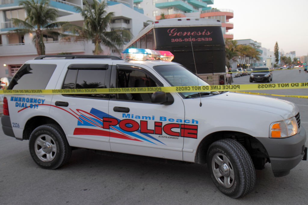 A police car at a collision site on Ocean Drive.
