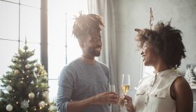 Couple drinking champagne on Christmas