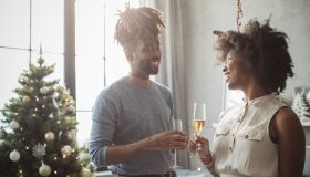 Couple drinking champagne on Christmas