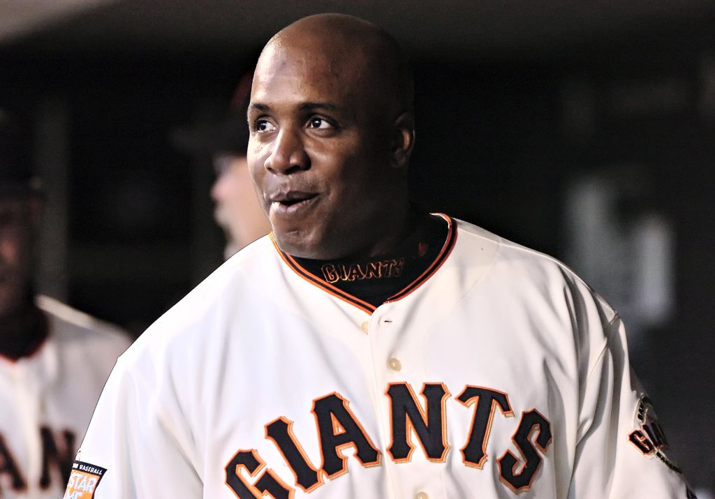 San Francisco Giants Barry Bonds, #25, is all smiles after scoring on a fielding error by Arizona Diamondbacks Orlando Hudson, #1, in the 1st inning of their game on Friday, April 20, 2007 at AT&T Park in San Francisco, Calif. Giant's Barry Bonds and Ray