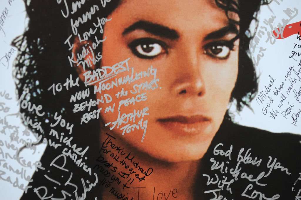 A poster of Michael Jackson is covered w
