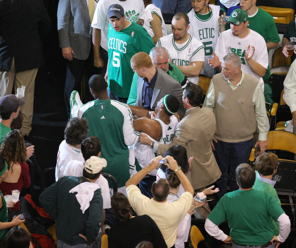 (060508 Boston, MA ) Boston Celtics forward James Posey and Brian Scalbrine caried Boston Celtics forward Paul Pierce off the court after he was injured in the 3rd quarter as the Los Angeles Lakers and the Boston Celtics play game 1 of the NBA Finals