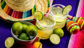Happy Cinco de Mayo with two Margarita Glasses on a Colorful Background
