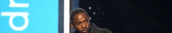 Kendrick Lamar performs at Louis Vuitton fashion show, honors