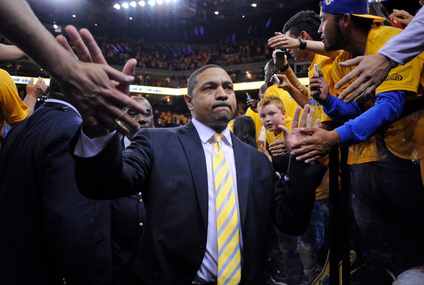 Golden State Warriors head coach Mark Jackson returns to the locker room after losing to the San Antonio Spurs in Game 6 of the Western Conference semifinals at Oracle Arena on Thursday, May 16, 2013, in Oakland, Calif. San Antonio defeated Golden Sate 94
