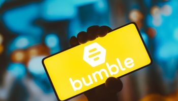In this photo illustration, the Bumble logo is displayed on...