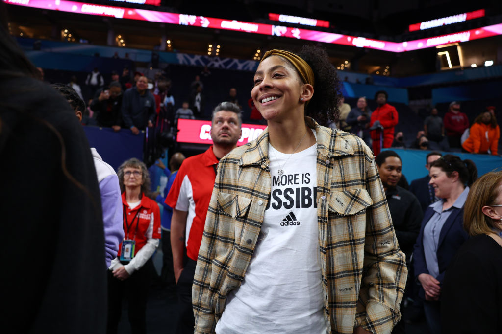 Candace Parker and Family Attend NCAA Women's Championship Game In adidas "More Is Possible" Tees