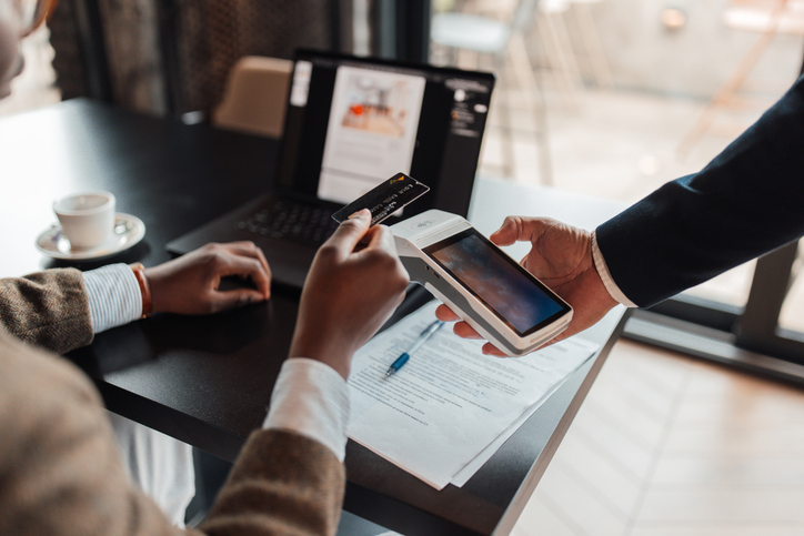 Using Mobile Payment with Card at a Cafe Table